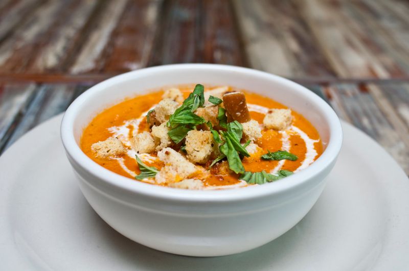 Roasted Tomato Bisque with fresh basil and cream