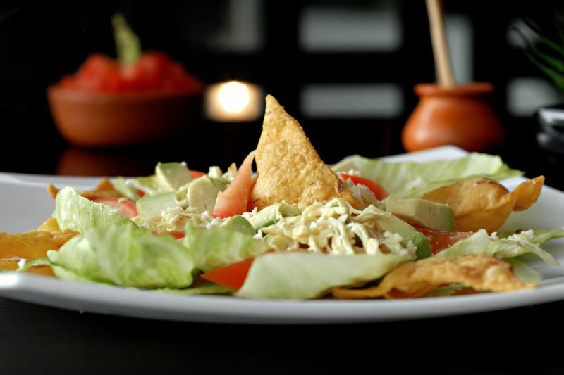 Chicken Tortilla Soup with avocado and crispy strips